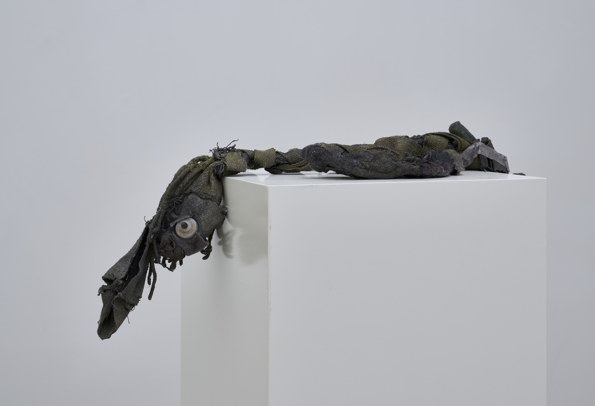 Flower 1, 2024, Doll, clothing, pigment, varnish, found objects, Dimensions variable